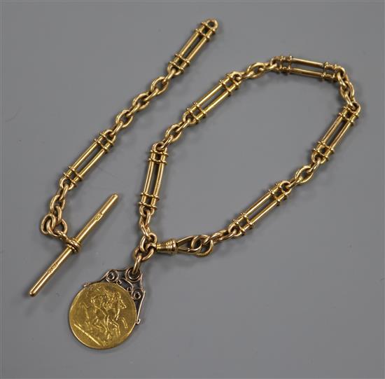 An 18ct gold bracelet (ex albert), hung with a George V full sovereign,